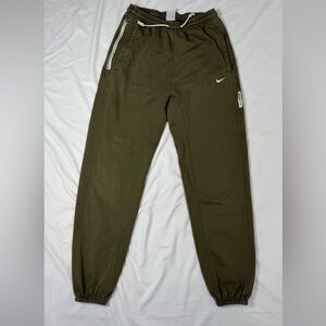 Nike Green Joggers with Elastic Cuffs and Tapered Fit